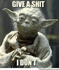 A humorous image of a character with pointed ears and wise expression, holding a hand together, with the text 'GIVE A SHIT I DON'T' above.